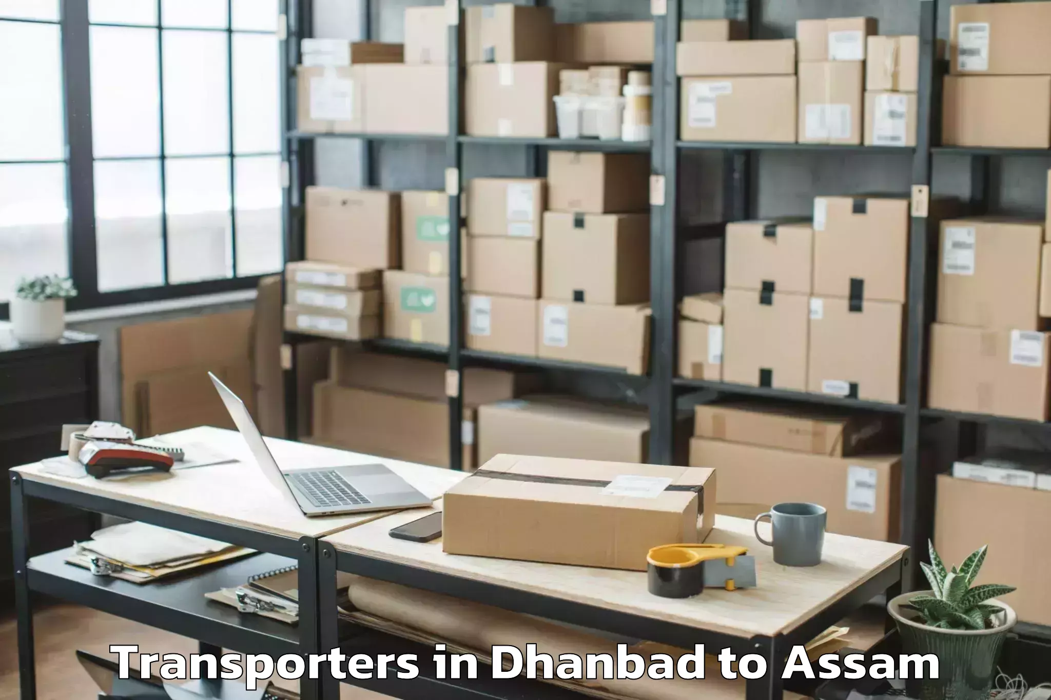 Book Dhanbad to Chhaygaon Transporters Online